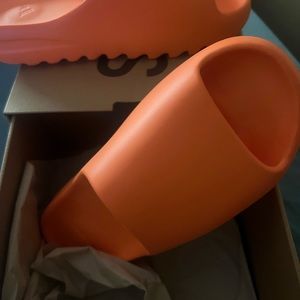 Size 11 orange Yeezy slides brand new never worn
